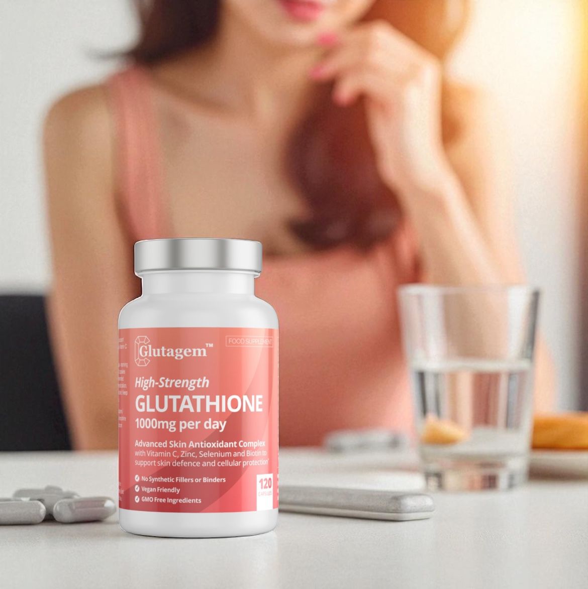 Glutagem Glutathione supplement bottle on a table with a blurred background of a woman.